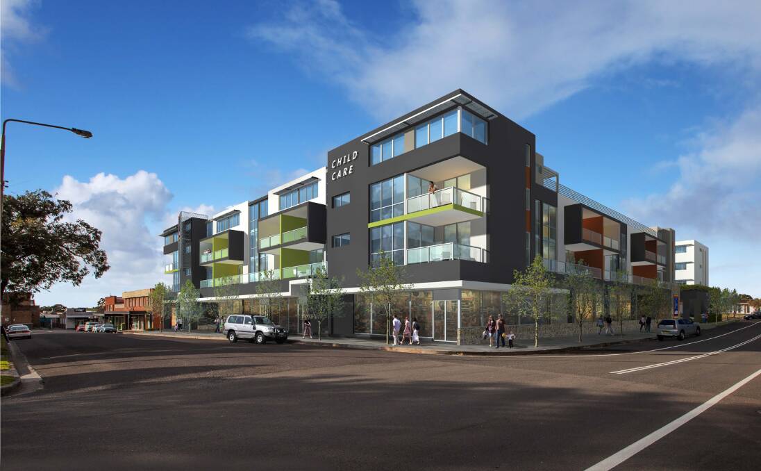 RENEWAL PLANS: An artist's impression of the four-storey complex proposed for Corrimal town centre which would house an Aldi supermarket and childcare centre. Picture: Architex