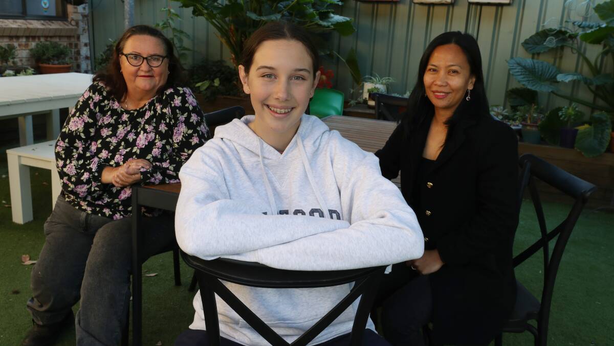 Lived experience advocate Jane Matts, 16-year-old youth advocate Alyssa, and survivor Faith Labaro say it's vital to prioritise the voices of those who have experienced domestic and family violence. Picture by Robert Peet.