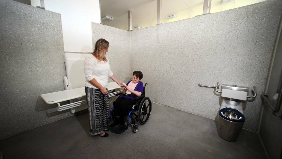 Accessible: Carer Alysha Sleiman with Balgownie resident Jenni Mathews at the Stuart Park amenities block which includes an adult change table. Picture: Sylvia Liber