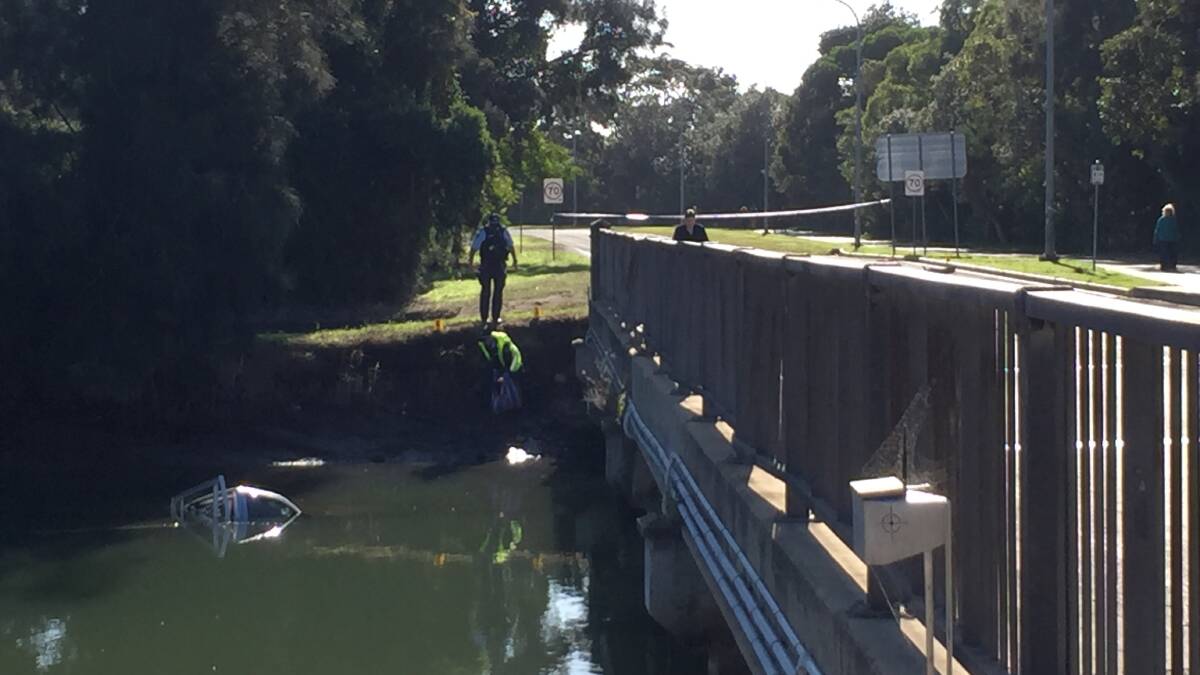 North Wollongong road closed after car veers off road into creek