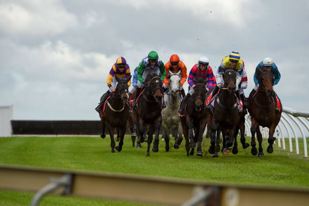 BRING IT HOME: General view of the field racing around the back straight in The Australian Steeplechase during Melbourne Racing at Sandown Lakeside in May. (Photo by Vince Caligiuri/Getty Images)