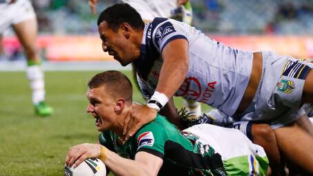 ON TOP: Jack Wighton of the Raiders dives over to score his second try during the round 18 NRL match between the Canberra Raiders and the North Queensland Cowboys. (Photo by Brendon Thorne/Getty Images)
