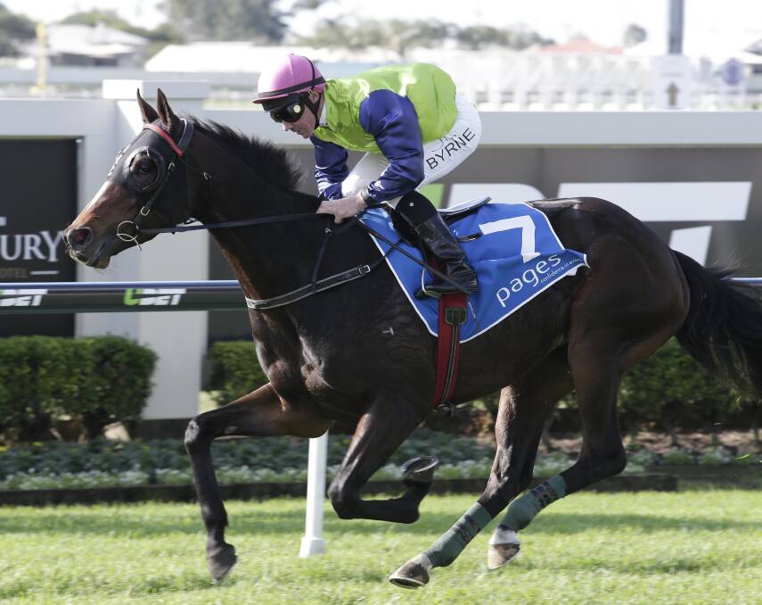 Jim Byrne riding on Werther wins the Pages Event Equipment Hire Eagle Farm Cup at the Oaks Day, Doomben, Brisbane, 30 May 2015. Photo: Tertius Pickard.
