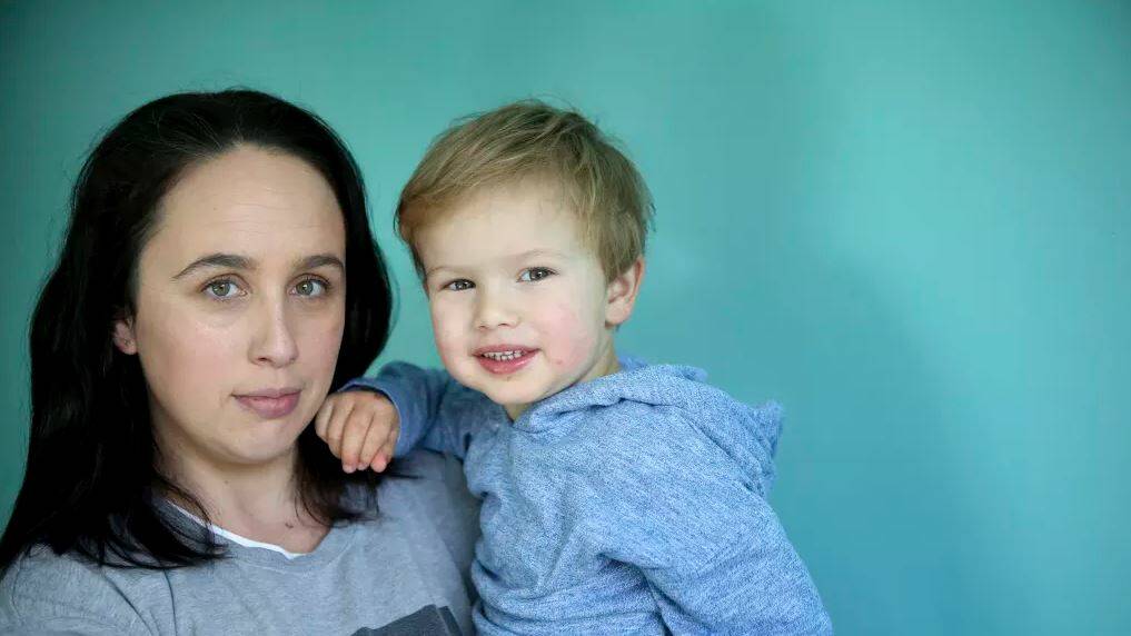 ‘‘There’s no point me going back to work, my salary would go to childcare’’: Cait Dooley with her son Dashiell.

Photo: James Alcock