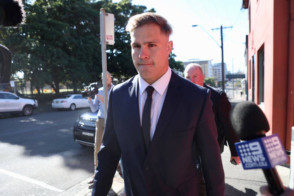 Jack de Belin arrives at Wollongong courthouse on Friday.