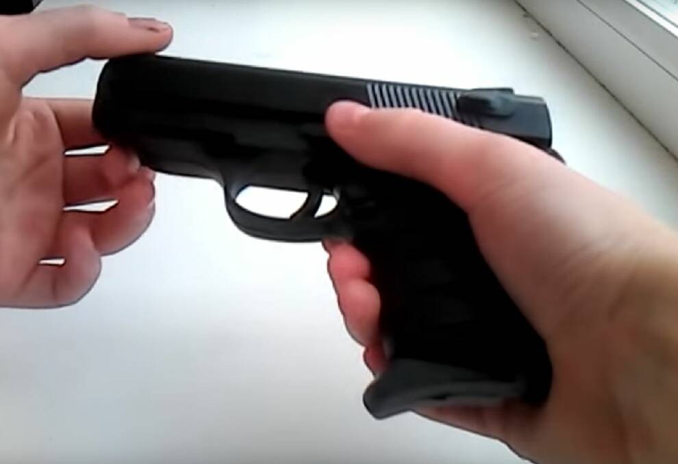 A still shot from a YouTube video examining the PAIFA P.0621 Air Soft Gun, the same kind that was destined to end up a present for a five-year-old Illawarra child.