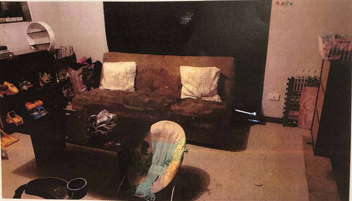 Police say they were overwhelmed by the presence of faeces and urine stains throughout the house, including on this couch in the loungeroom.