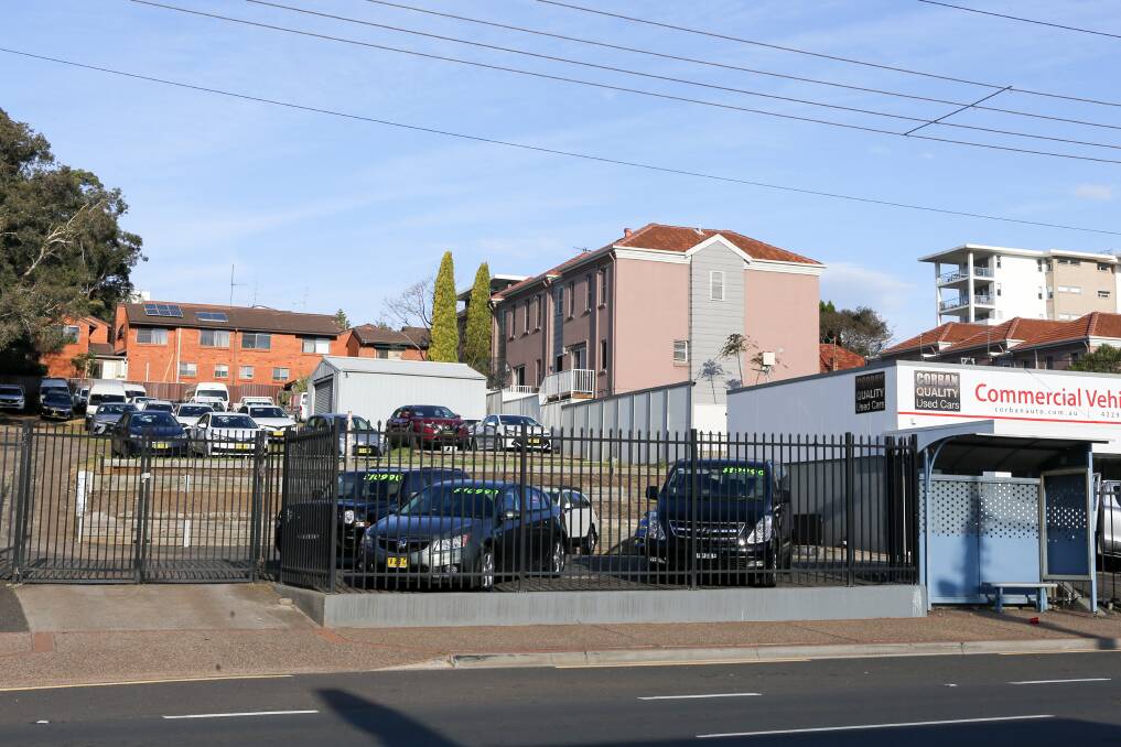 Cars no more: Developers will remove the existing structures on the site and replace them with two apartment blocks.