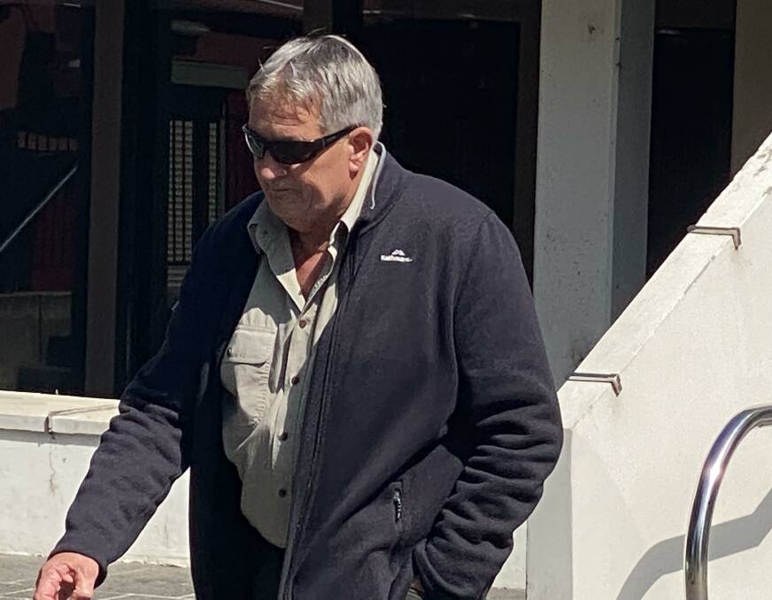 Graham Squires leaves Wollongong courthouse on Thursday after being found guilty of two counts of dangerous driving occasioning death.