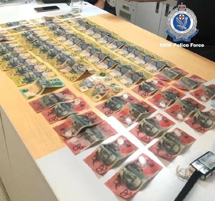 Cash seized during the operation.