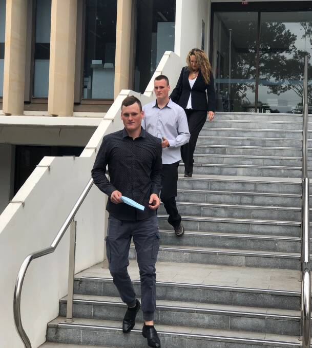 Busted: Identical twins Leroy and Riley Hezemans (we're not sure which is which, they wouldn't tell us) leave Wollongong courthouse after pleading guilty to robbery in company charges.