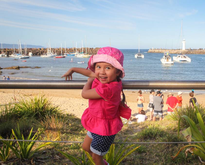It's mine!: Mia-Rose Stott, 3, from Bulli, got in early at Belmore Basin to make sure she had a prime viewing spot ahead of the 9pm New Year's Eve fireworks. Picture: Adam McLean