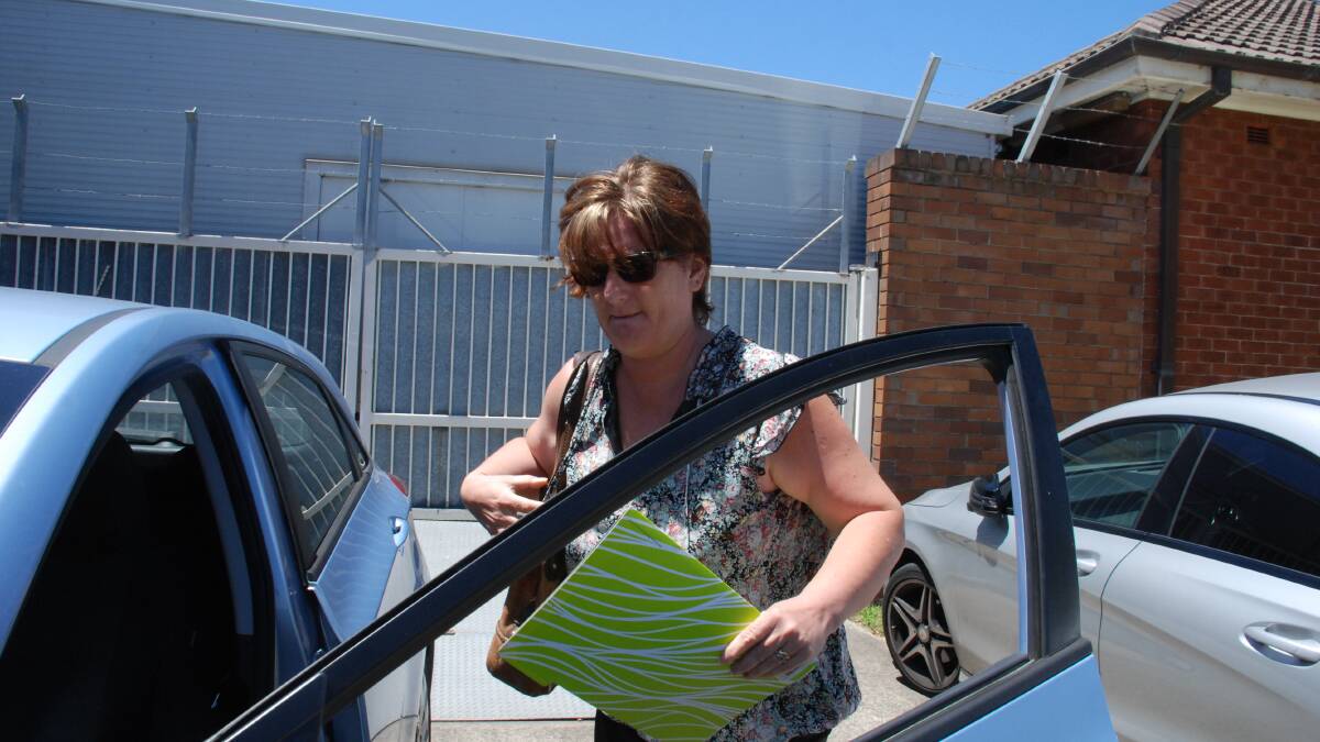 Fresh charges: Former Hope Centre Food Barn manager Lizzie Millar now stands accused of swindling almost $100,000 from the charity she led. She is pictured leaving court during an earlier appearance.
