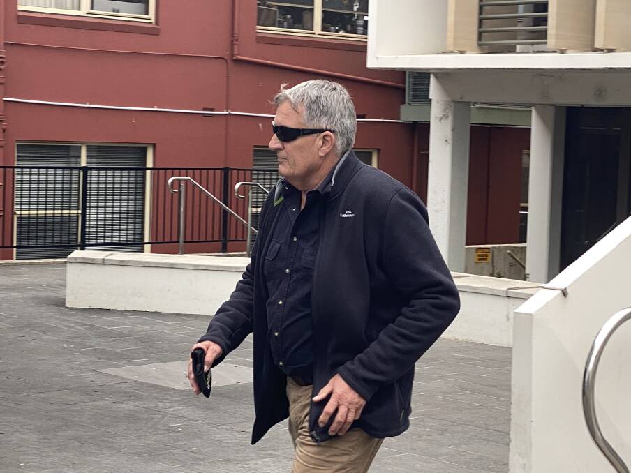 Graham Squires leaves Wollongong courthouse on Monday after the first day of his trial.