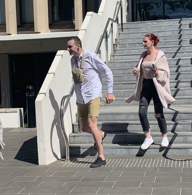 Joshua Kemper leaves Wollongong courthouse on Tuesday accompanied by a supporter.