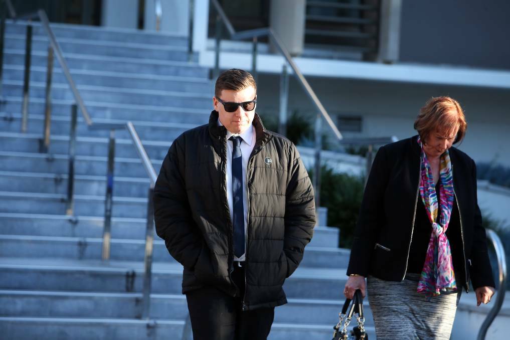 Benjamin O'Brien leaves Wollongong Local Court on Thursday, accompanied by his mother. Picture: Sylvia Liber