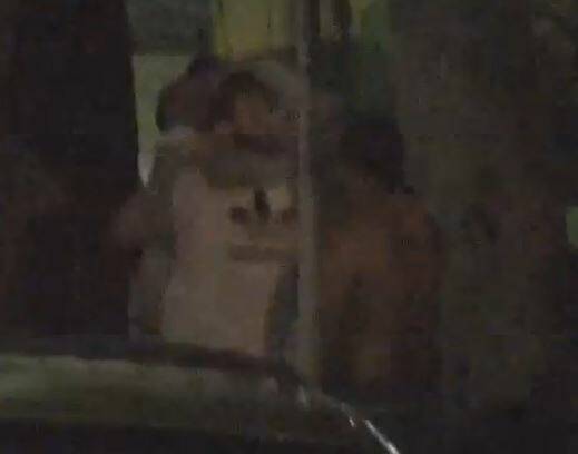 Second assault: Grainy footage shows one of Sullivan's friends grab Thomas Jurkiewicz (white shirt) in a headlock moments before Sullivan (right) attacks him.