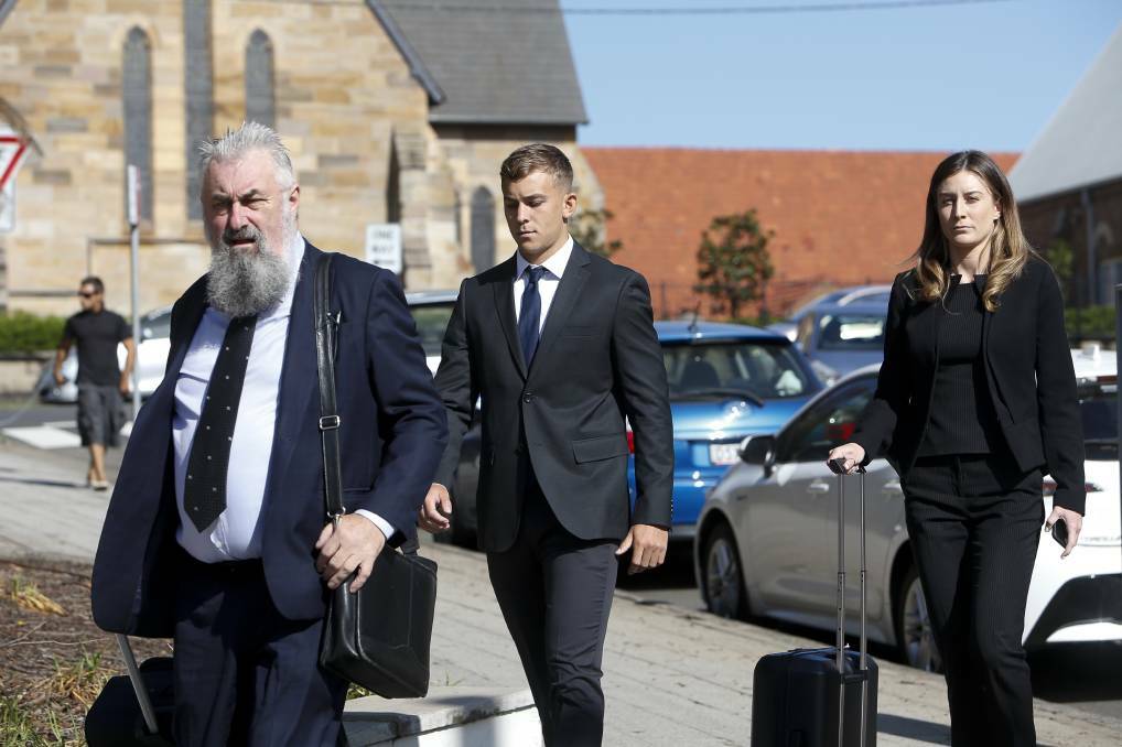 Callan Sinclair arrives at Wollongong courthouse on Monday morning with his lawyers Graeme Morrison and Alicia Boehm.