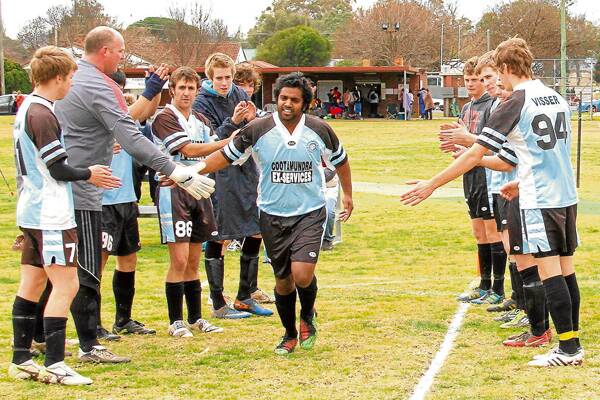 Sporty: Wayd Millar (centre) is involved in sporting teams in Cootmaundra and was the town's Young Citizen of the Year in 2012. Picture: Cootamundra Herald