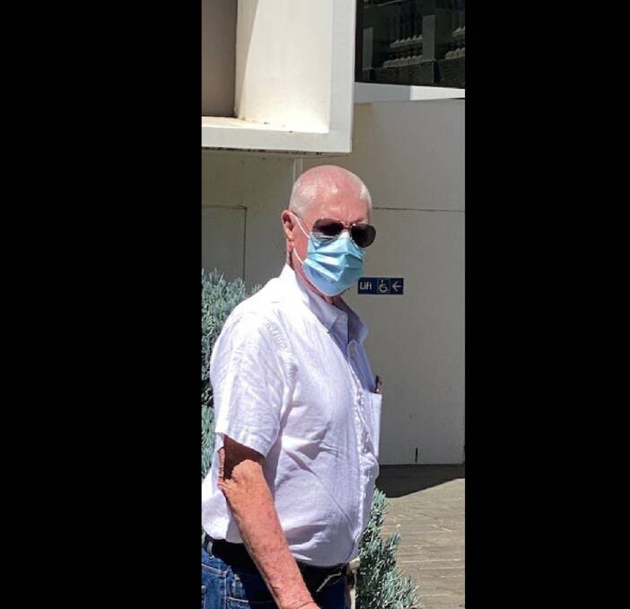 Dennis Walker leaves Wollongong courthouse after being fined for breaching his Child Protection Register conditions.