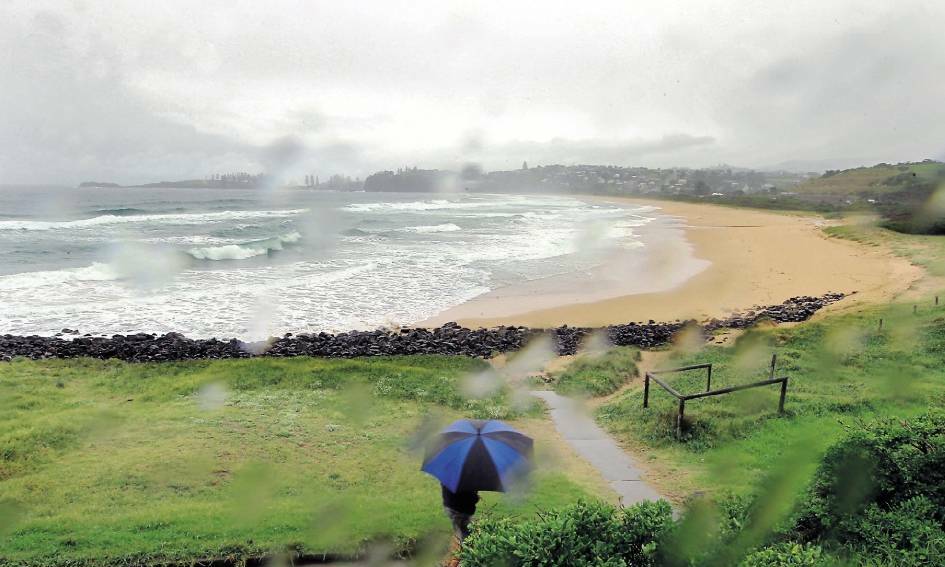 ONGOING ISSUE: In 2013, Bombo Beach was closed because of sewage outfall and bad weather. Wollongong MP Noreen Hay asked Sydney Water for a 'please explain'. The agency said the plants were just doing what they were meant to do. Picture: SYLVIA LIBER