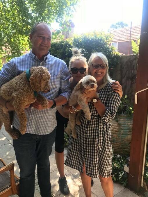 REUNITED: Tilly (right) is now in the loving care of her owners after three weeks on the loose in Kiama. Picture: Contributed