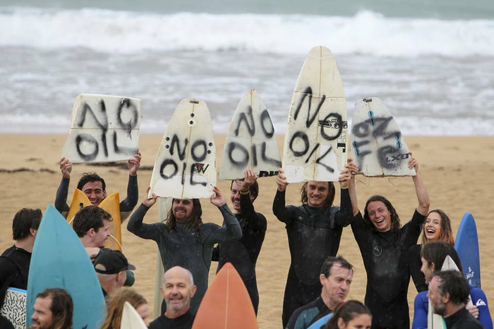 NEXT STOP KIAMA: People paddled out at North Wollongong beach on Sunday to fight oil-drilling plans in the Great Australian Bight. Picture: Anna Warr