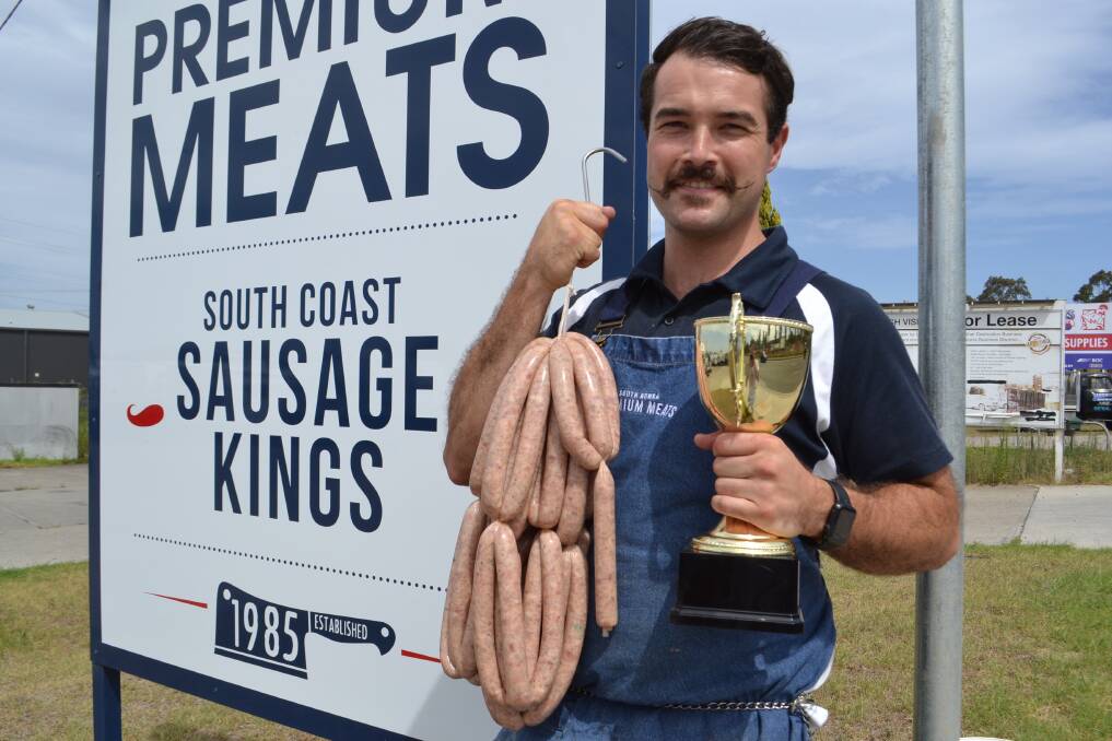 SAUSAGE KING: South Nowra Meats' Kory Edwards honoured to win the national title for his peking duck gourmet sausages on Saturday. Picture: Rebecca Fist