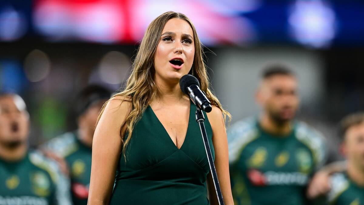 Olivia Fox sang in the Indigenous Eora langauge on Saturday night. Picture: Stuart Walmsley (Rugby Australia)