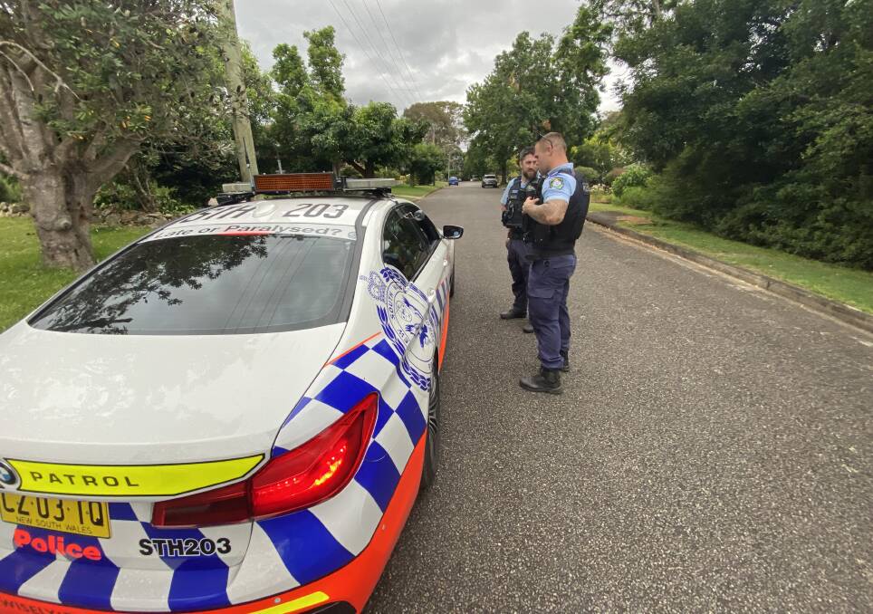 PERIMETRE: South Coast Police set up a perimetre around surrounding streets looking for a male driver who allegedly fled a crash scene on the Princes Highway at Bomaderry on Saturday afetrnoon.
