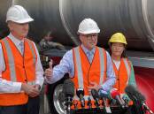 ON THE HUSTINGS: Labor leader Anthony Albanese with Shadow Minister for Industrial Relations Tony Burke and Gilmore MP Fiona Phillips and during his visit to the Shoalhaven on Thursday.