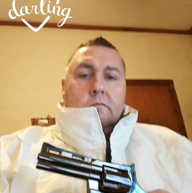 Edward Grahovac, 46, also known as Edward Curic, poses with the pistol on Facebook.