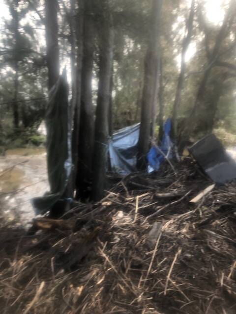 WRECKED: What was left of Michael Dadd's campsite just off Pig Island after the recent floods.Photo: Justin Smith