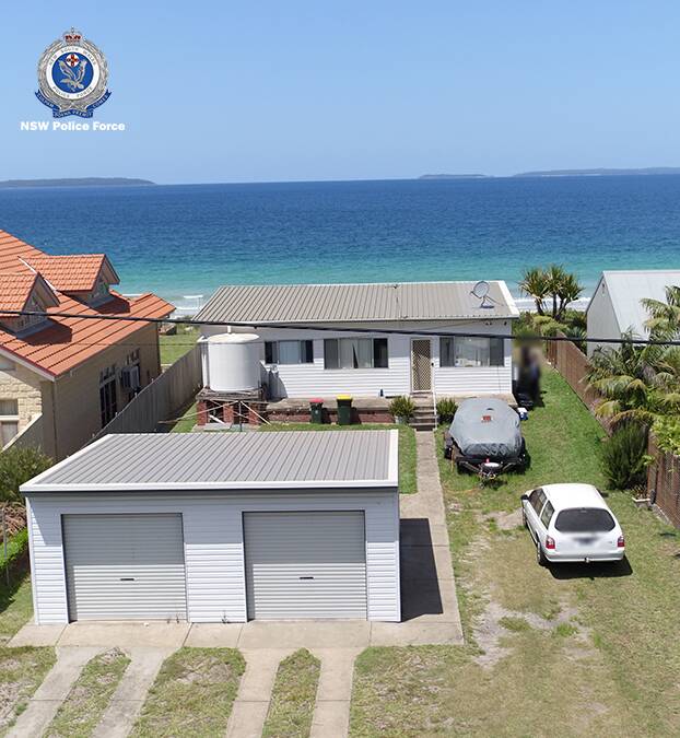 The house police raided at Quay Road Callala Beach looks over Jervis Bay. Photo: NSW Police