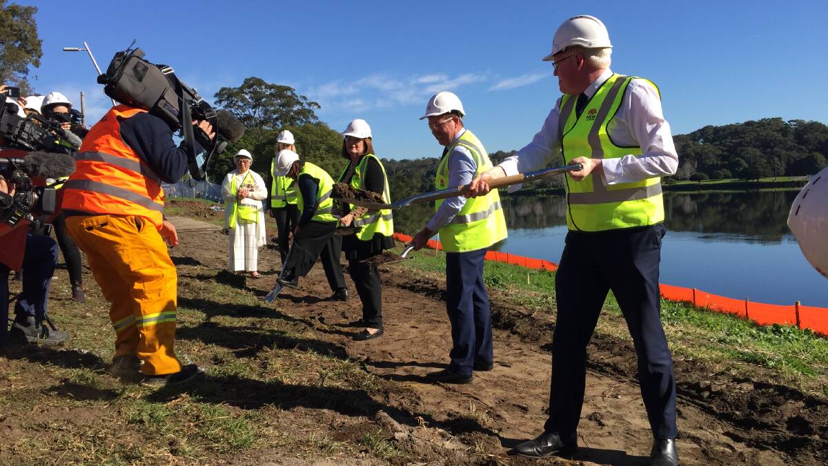 Michael Pignataro covering the sod turning of the new $434 million Nowra bridge - of course, right in the middle of the action. Nice high-vis by the way!
