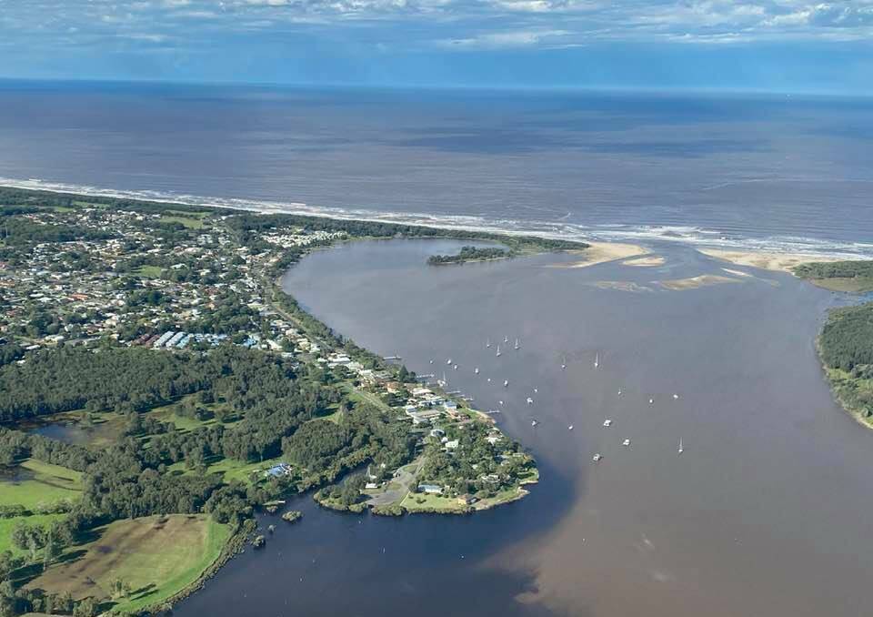 Shoalhaven River in flood, opening at Shoalhaven Heads. Photos: Max Cochrane
