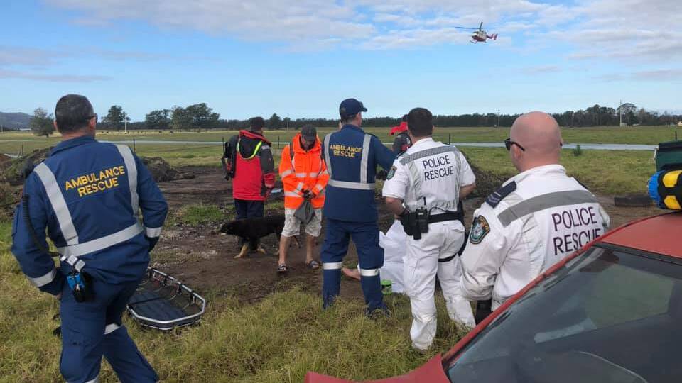 RESCUED: Emergency services wait for a helicopter to land on Pig Island to airlift Michael Dadd to safety. Image NSW Police Rescue & Bomb Disposal Facebook