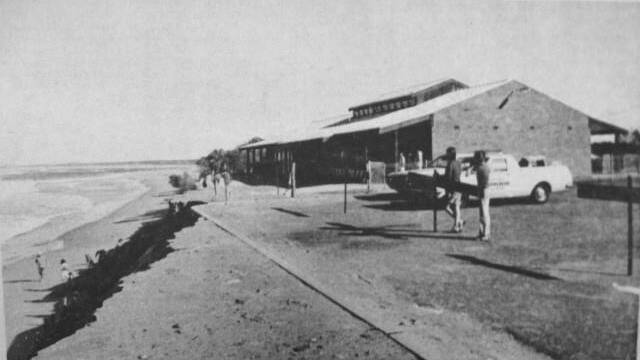 CLOSE: 1977 when Seven Mile Beach erosion threatened the Shoalhaven Heads Surf Club. Image: Shoalhaven in the 20th Century
