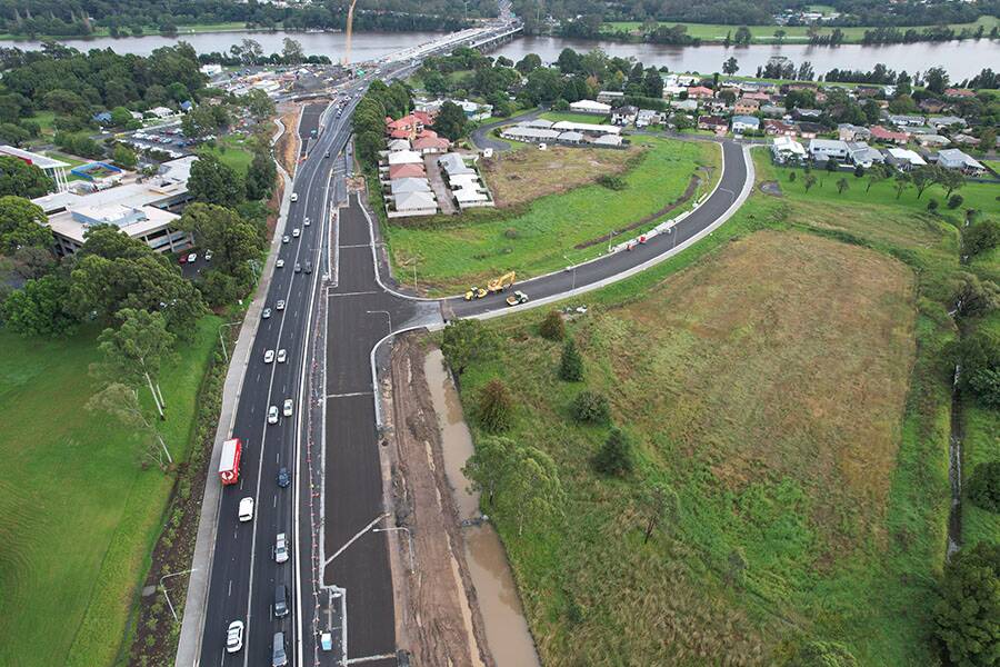NEW CONNECTION: The lower structural pavement layers have been laid at the intersection of the Princes Highway and new road Shearwater Way, which will be the new link connecting Lyrebird Drive to the Princes Highway. Image: Transport for NSW