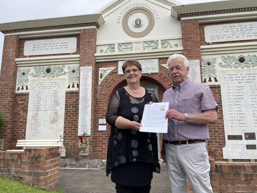 
NEW BOOK: Author Robyn Florance and Gerringong RSL Sub-Branch president Michael OLeary with the manuscript of Soldiers Memorial Hall Centenary book Mrs Florance has produced.