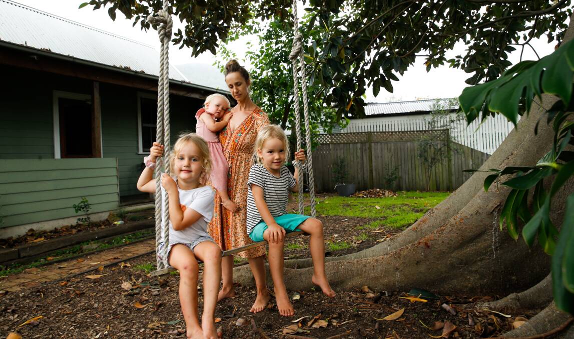 WELCOMED PROGRAM: Thirroul mum Kristen McDonald - with her children Eden, Taz and Arkie who all attend childcare - says the test to stay program will benefit parents but the rules have been confusing. Picture: Anna Warr