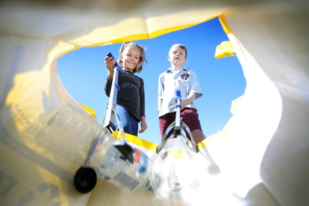 Hannah Colefax, 5 and Fletcher Hartley, 6, are excited to swap trash for treasure at the upcoming Seaside Scavenge at Lake Illawarra. Picture by Sylvia Liber.