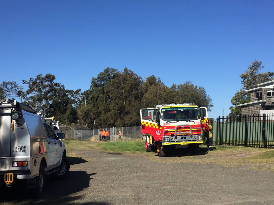 EMERGENCY: Fire crews on scene at a grass fire at Burroo Street in Albion Park Rail on Wednesday. Picture: Sylvia Liber