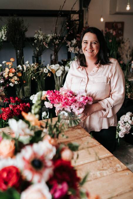 Wedding specialist Leah Mitchell is flat-out preparing floral installations every other day, as rescheduled weddings now pop up on any day of the week. Picture: The Evoke Company