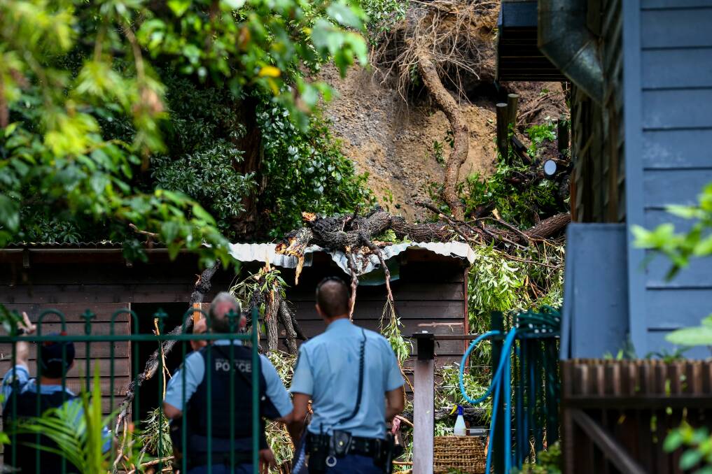 LANDSLIDE: A woman was hit by a falling tree at a home in Asquith Street in Austinmer. Picture: Wesley Lonergan