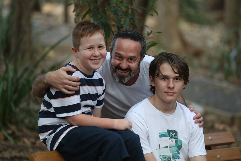 POSITIVE IMPACT: Michael Bowden now volunteers for Habitus after taking son Braith (right) to one of their camps and will soon be taking youngest son Griffyn. Picture: Robert Peet