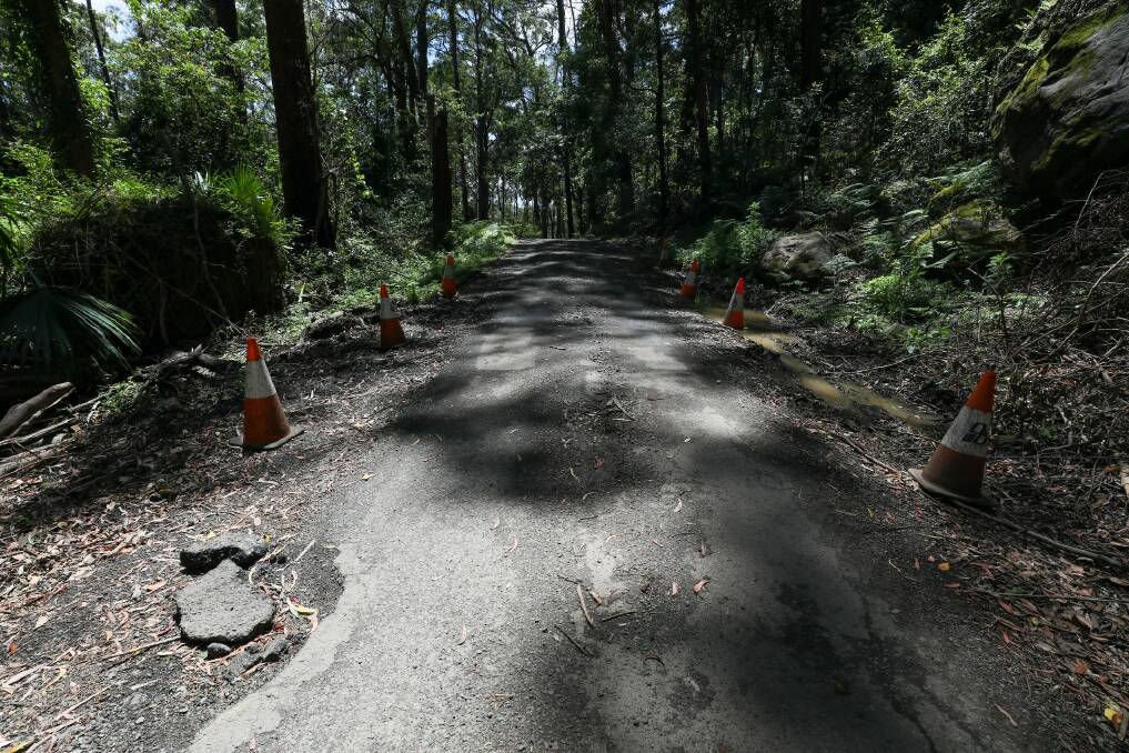 Some areas of Yellow Rock Road have been temporarily fixed with loads of gravel, though other areas show signs of weakness (as above) in the bitumen with cracks and major potholes. Picture by Adam McLean