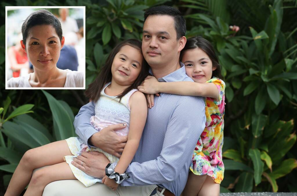 MISSING HER: Adrian Waters with his daughters Ava, 7, and Anara, 5. Adrian lost his wife Dr Sharlyn Kang to cancer after a five-year battle with cancer and running a GoFundMe to continue her legacy with medical research. Picture: Robert Peet