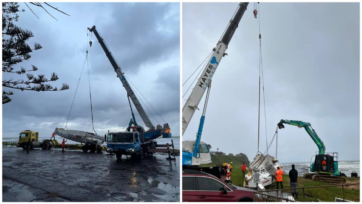 A yach that capsized near the Coledale coast in terrible conditions being craned off the beach on Tuesday. Picture: Illawarra and surrounds marine life sightings