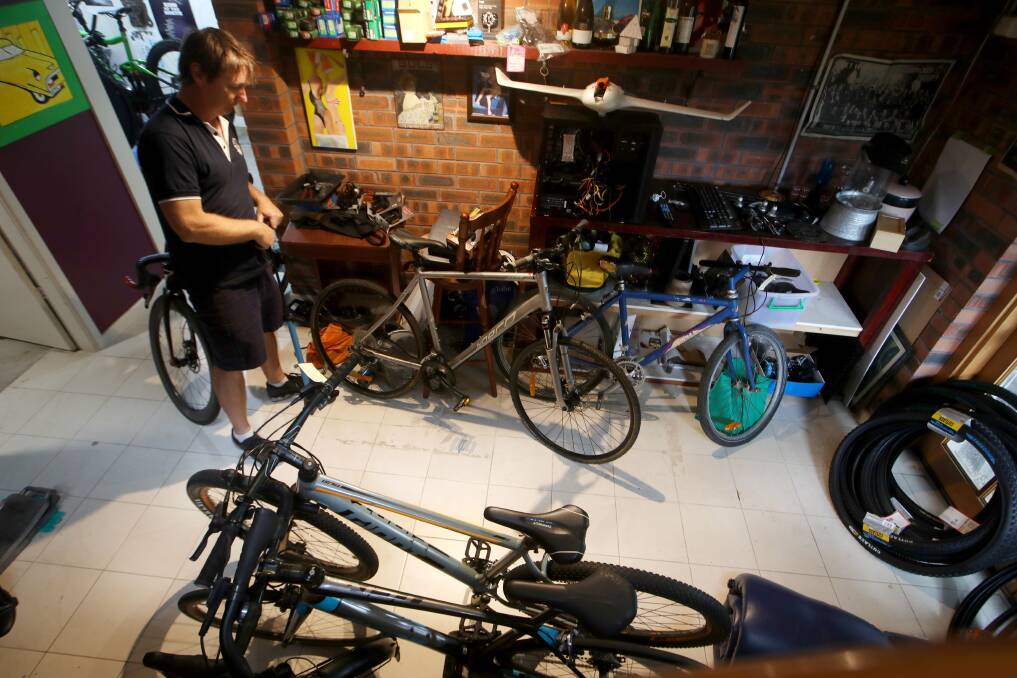 What started as a couple of bikes being fixed in a downstairs room of the double-storey home Mr Lindley shares with his wife Anita, now sees bikes and parts populating many corners of the house - including a bathroom. Picture: Sylvia Liber